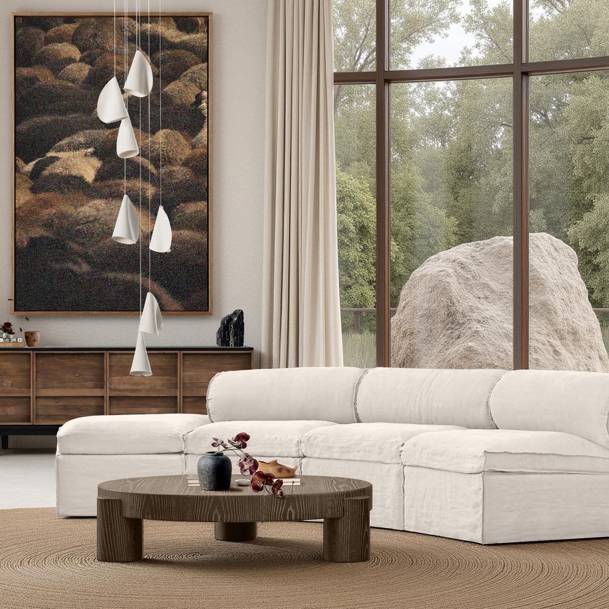 Mobital contemporary living room with soft seating and layered natural materials